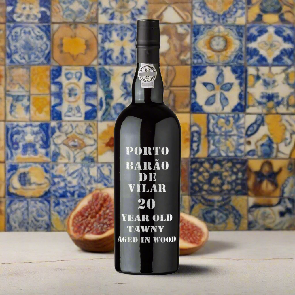 Classic Portuguese Countryside with Ceramic Tiles
A rustic, yet elegant backdrop inspired by traditional Portuguese aesthetics, featuring hand-painted tiles (azulejos) in the background, and a rustic wooden table or stone counter. The bottle, surrounded by walnuts, figs, and a few elegant dessert bites, evokes both the heritage and artistry behind the 20-year-old tawny port.