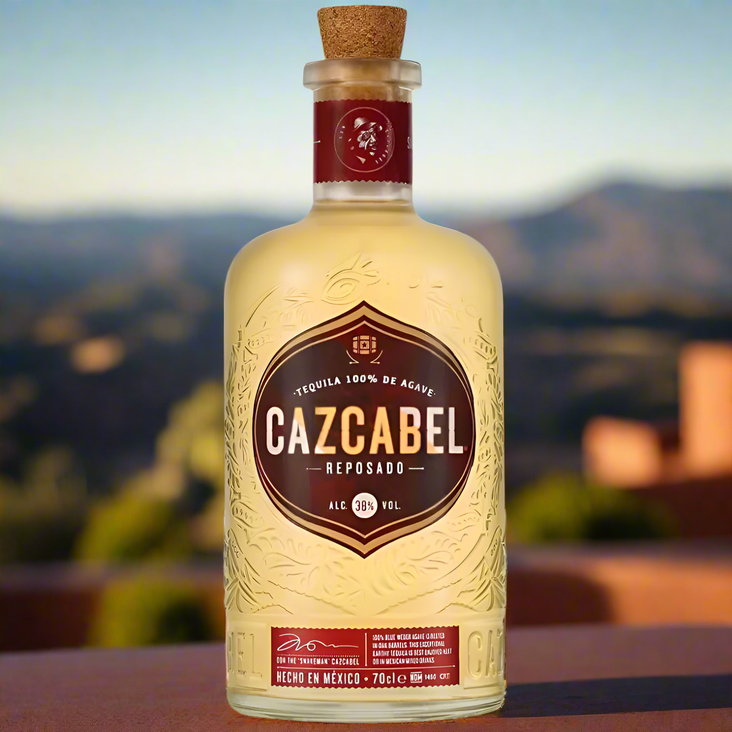 Cazcabel Tequila Reposado bottle on a sunlit rooftop terrace with lime and agave