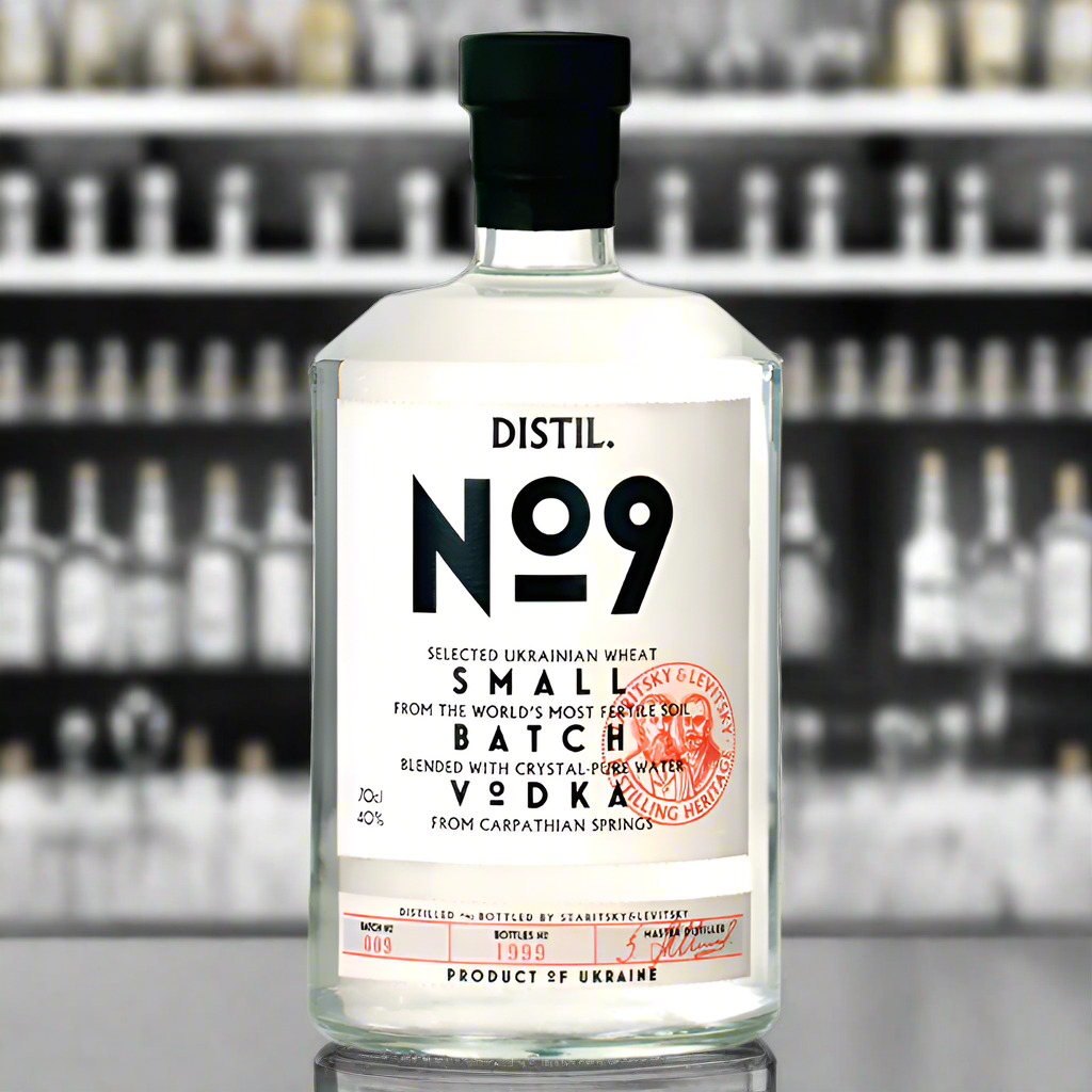 Minimalist, Chic Bar Setting
A sophisticated, dimly lit bar with sleek glassware, polished surfaces, and the bottle of Distil No.9 prominently displayed. The focus is on clean lines, with a softly blurred background of ambient lights and contemporary dĆ©corāperfect for highlighting the vodka's smooth and refined quality.