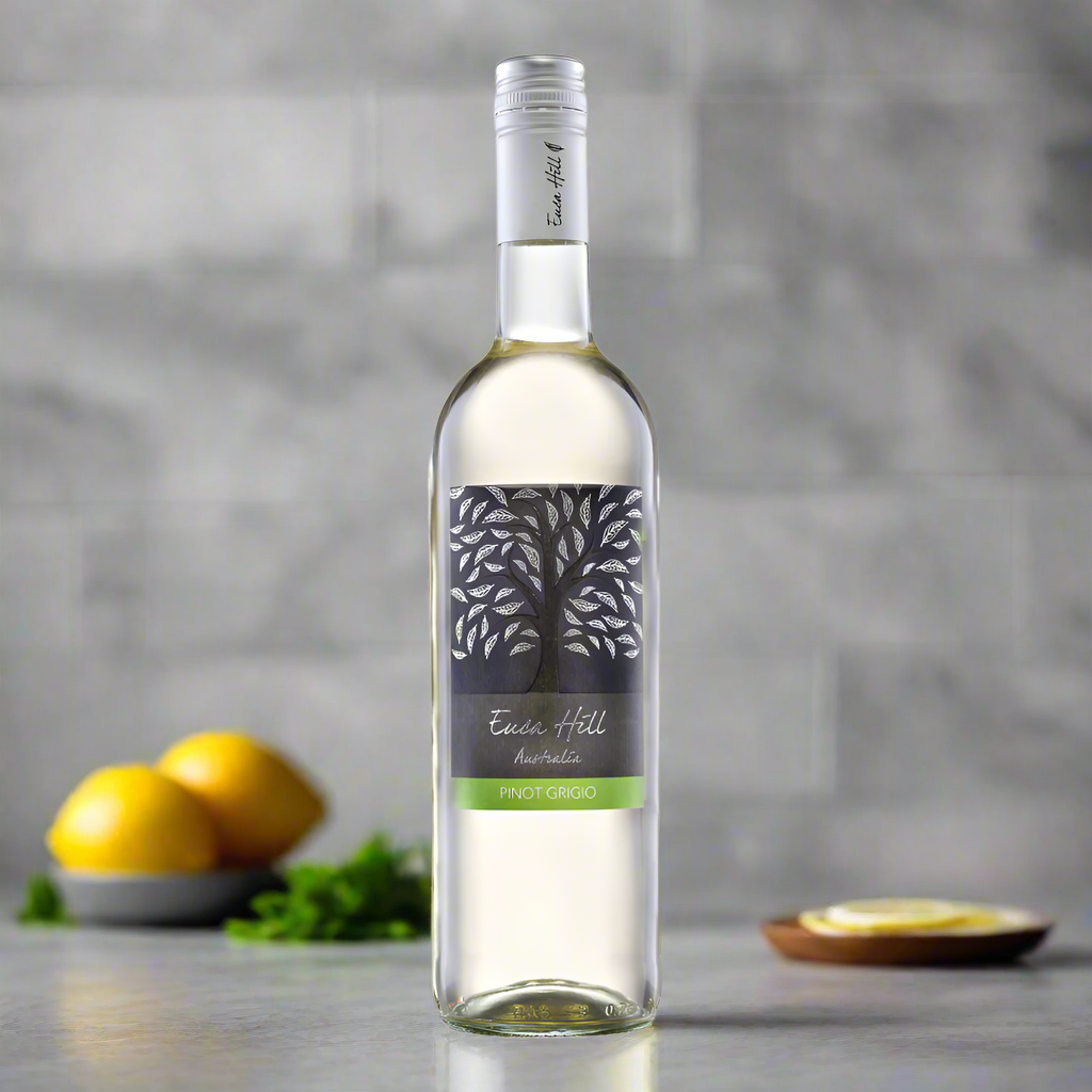 Euca Hill Pinot Grigio bottle on a modern kitchen counter with lemons and herbs