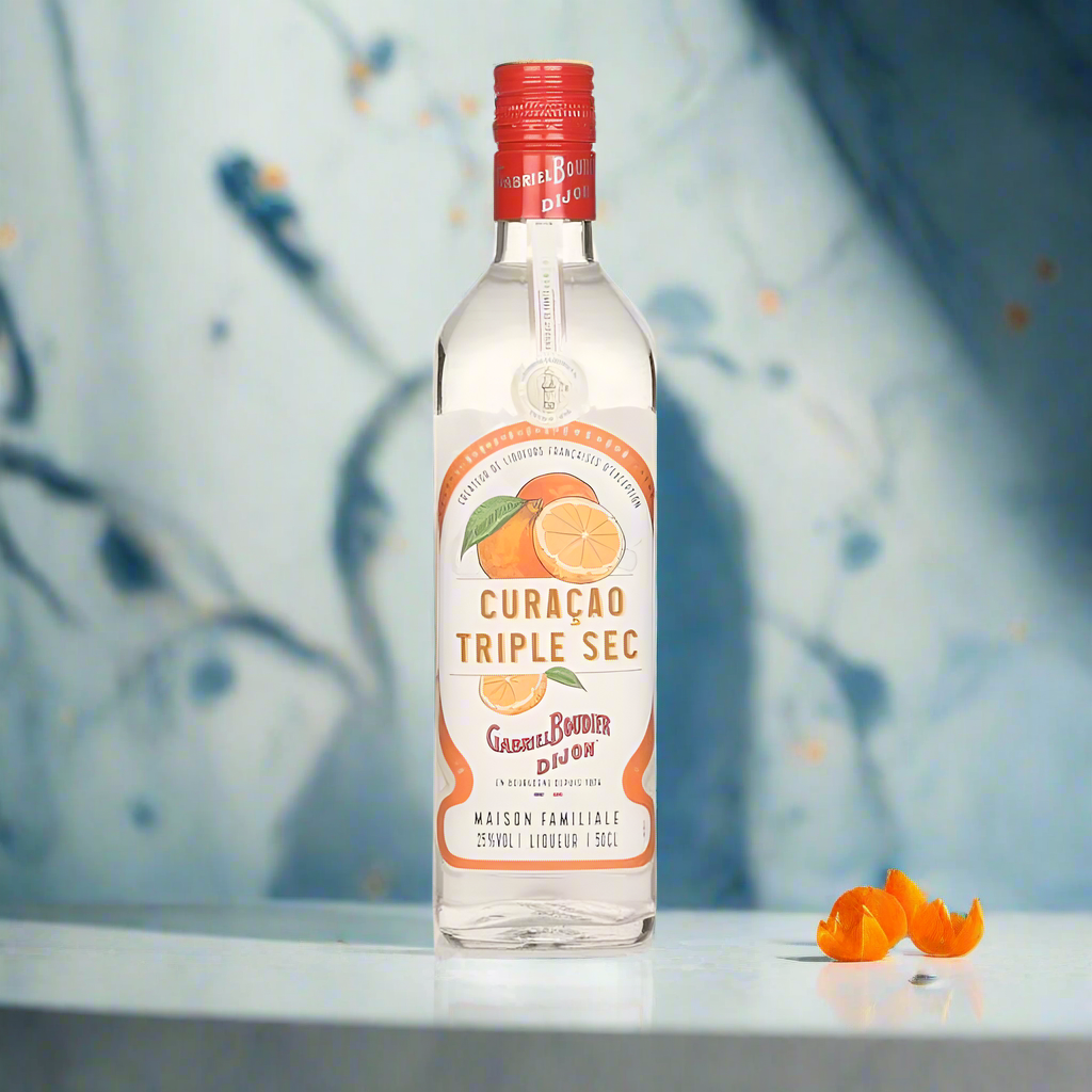 Sleek white marble surface with scattered orange zest and blossoms, backlit with cool daylight, abstract blue glass shapes in background, clean and minimalist aesthetic
