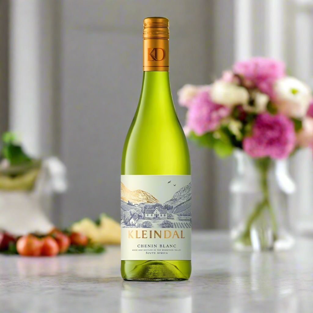 Place a bottle of Kleindal Chenin Blanc on a bright kitchen table with a simple lunch spread, fresh flowers, and soft natural light.