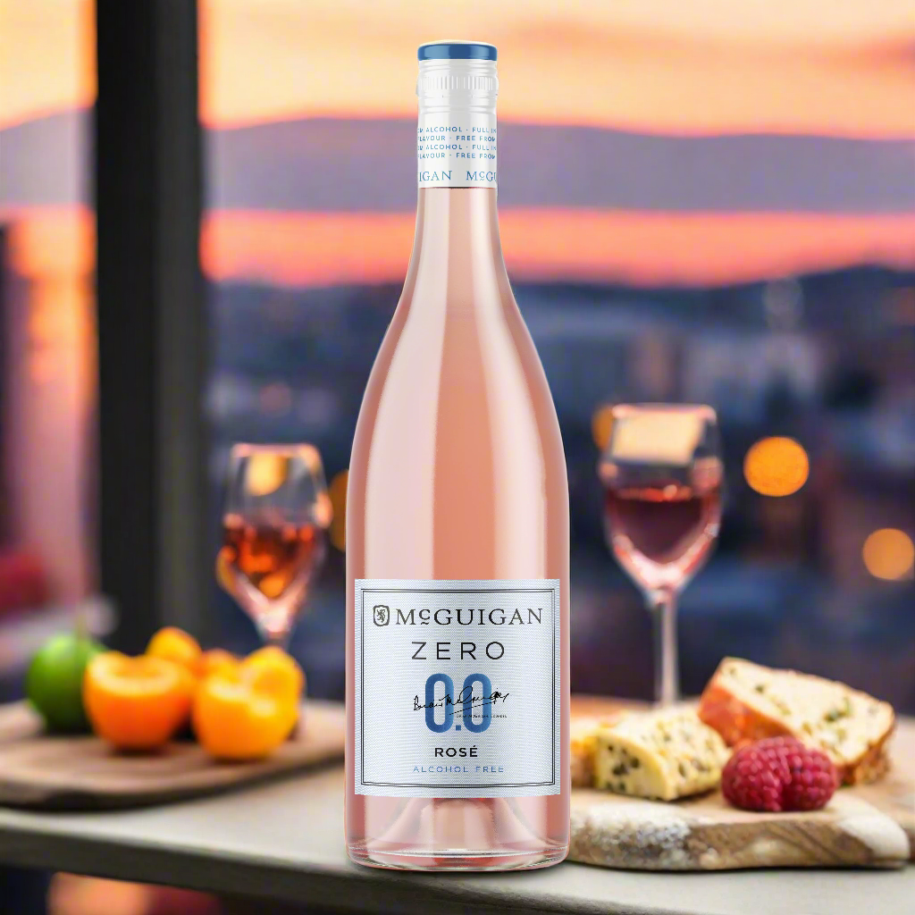 Modern Balcony Setting with a Sunset View
A stylish city balcony with cushions, fairy lights, and a bottle of McGuigan Zero Rosé alongside two glasses and a small cheese board. The sky glows with soft sunset colours, evoking a carefree, sociable mood without the alcohol.