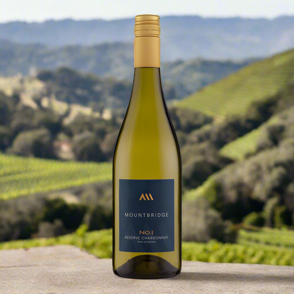 Place a bottle of Mountbridge Chardonnay Reserve on a stone table with misty hillside vineyards and eucalyptus trees in the background, evoking a cool-climate Australian setting.