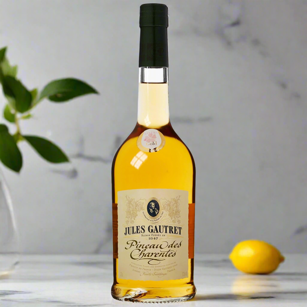 Pineau des Charentes Blanc Unicognac by Jules Gautret bottle in a kitchen settings.