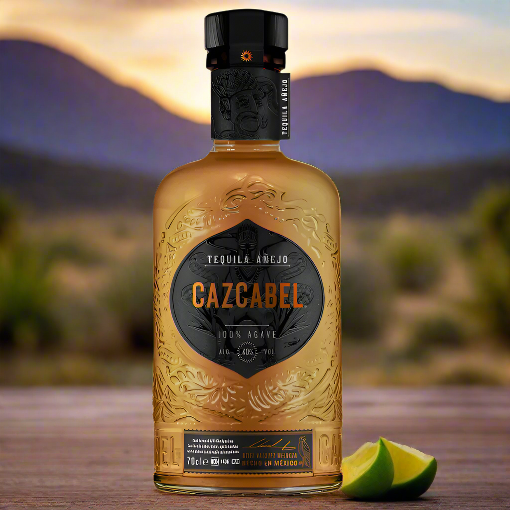 Gazcabel tequila bottle with lime, a sunset and mountains in the background