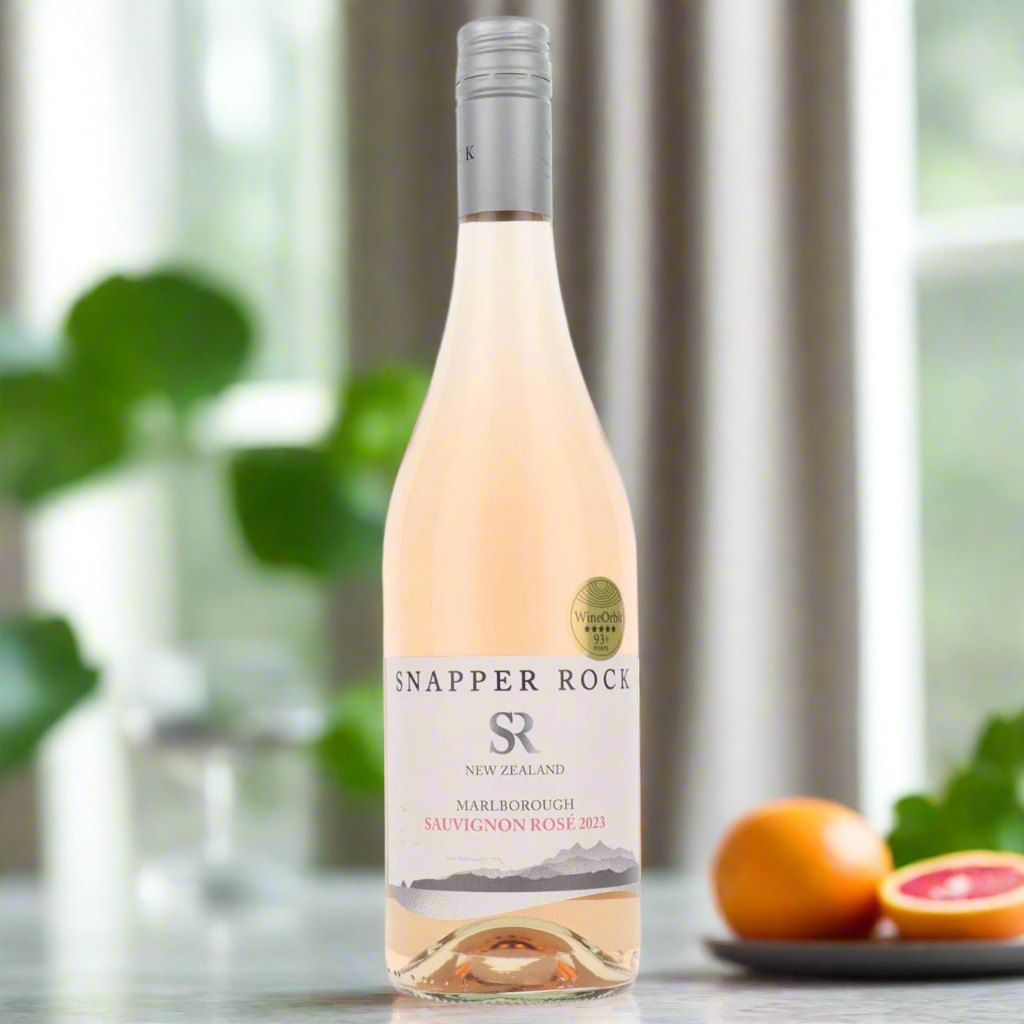 Snapper Rock rosé in a terrazzo kitchen with grapefruit and mint under soft daylight.