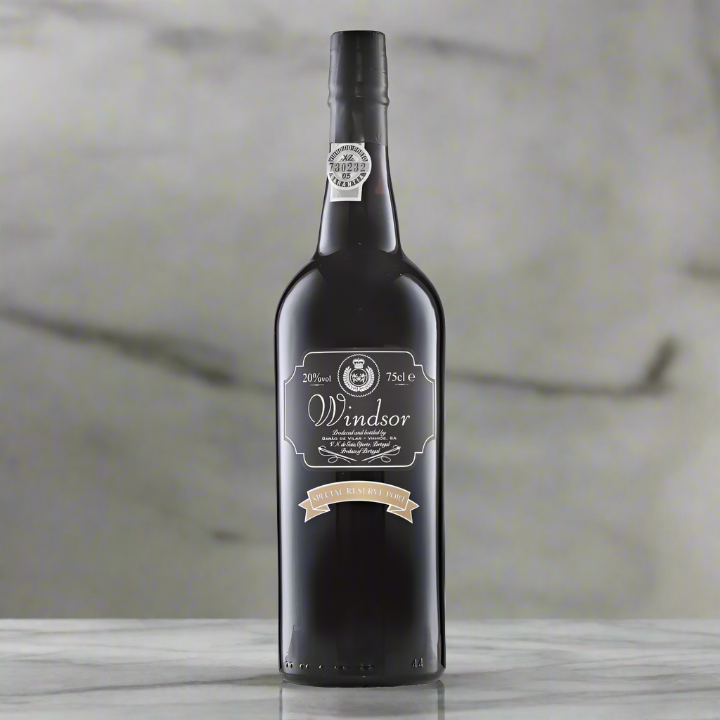 Windsor Special Reserve Port bottle on a minimalist marble surface with dramatic lighting and a clean, blurred background. Subtle reflections and a refined, premium feel.
