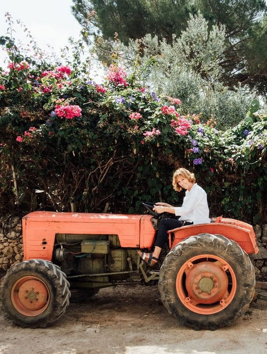 Celebrating the native grapes of Sicily and organic producer Azienda Agricola Cortese, with Marina Girelli sat on a red tractor.