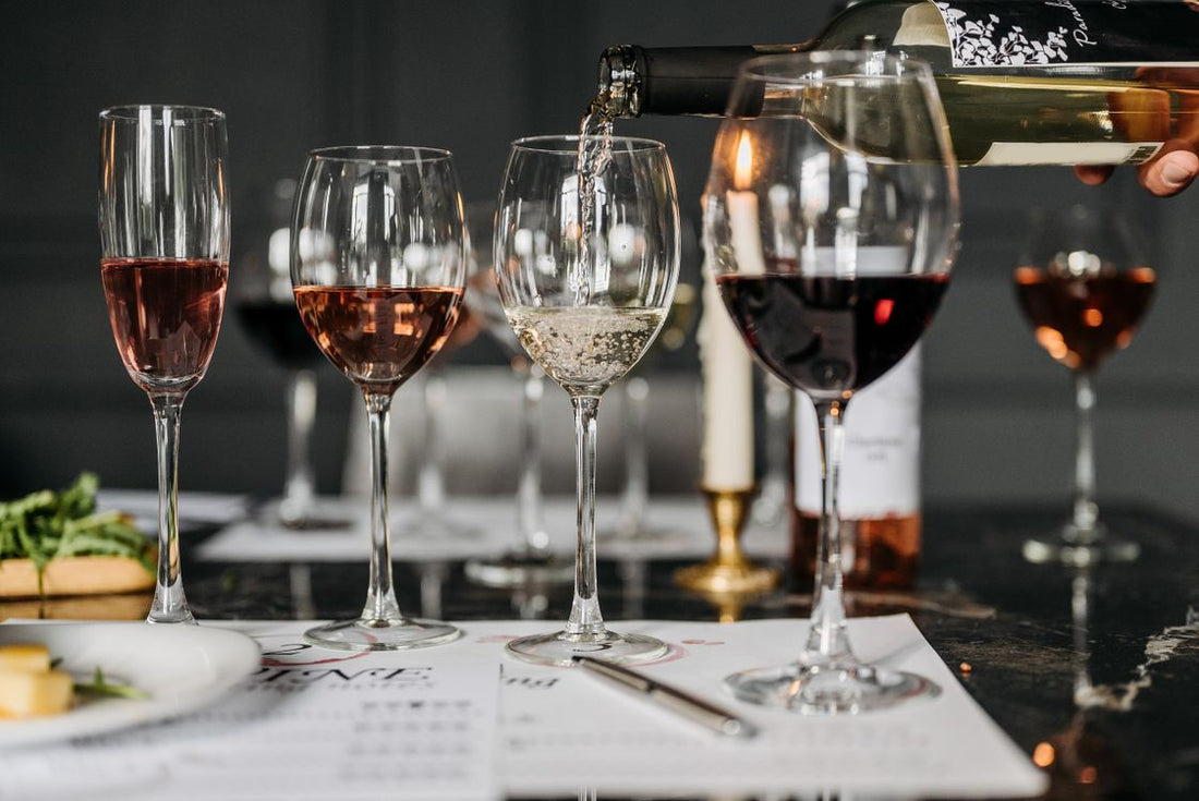 Elegant wine tasting setup with glasses of red and white wine