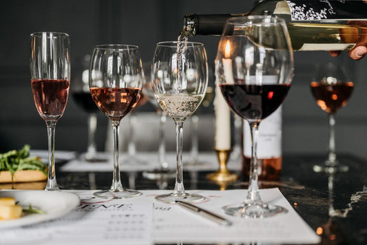 Elegant wine tasting setup with glasses of red and white wine