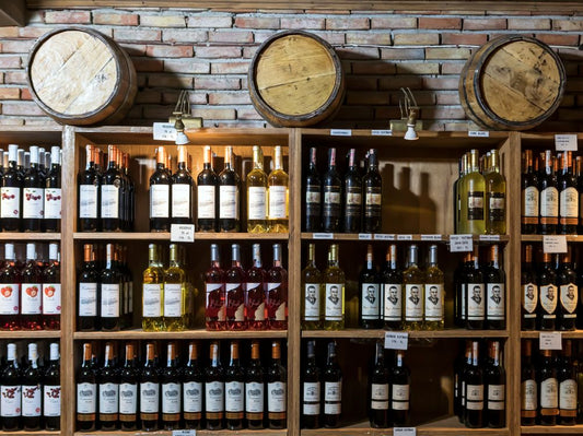 Rustic wine cellar with assorted bottles