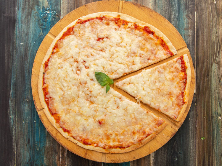 Margherita pizza on wooden board — wine pairing for pizza