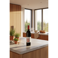 1270 A Vuit Red Priorat DOQ Organic 2016 wine bottle displayed on a contemporary stone kitchen island in a bright Mediterranean-style home.