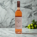 Vento’z Vinho Verde Espadeiro Rosé bottle on marble counter in bright modern kitchen.