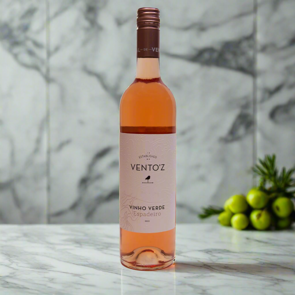 Vento’z Vinho Verde Espadeiro Rosé bottle on marble counter in bright modern kitchen.