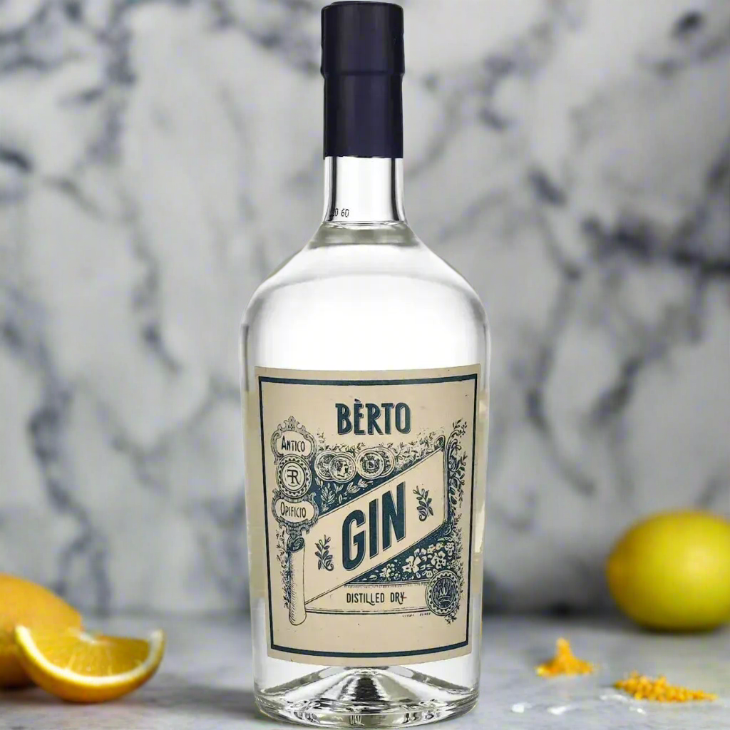 “Bèrto Distilled Dry Gin bottle on a clean marble counter with scattered botanicals and citrus zest. Bright, minimalist background with a fresh, contemporary look.”