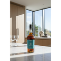 Blandy’s Sercial 10 Year Old Madeira wine bottle displayed on a marble kitchen island in a bright contemporary home.