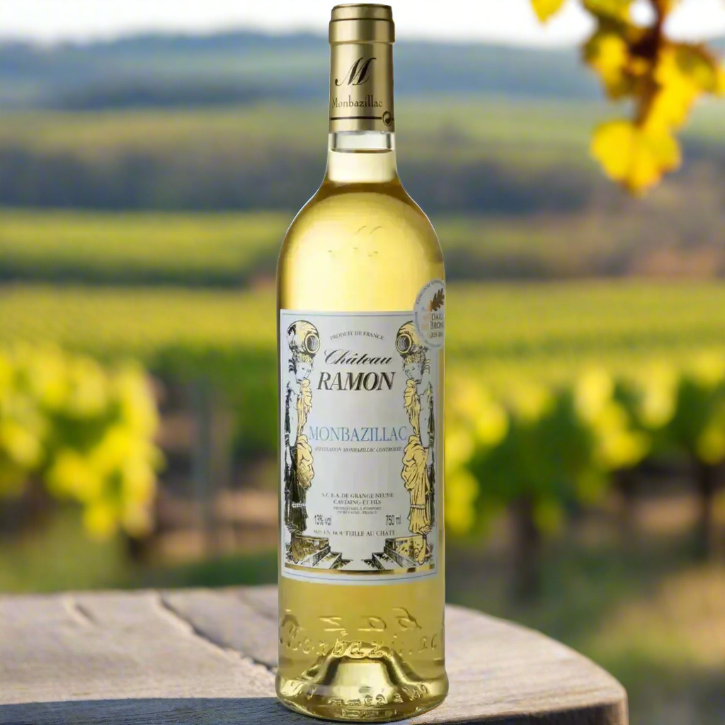 Château Ramon Monbazillac on terrace table with vineyard.