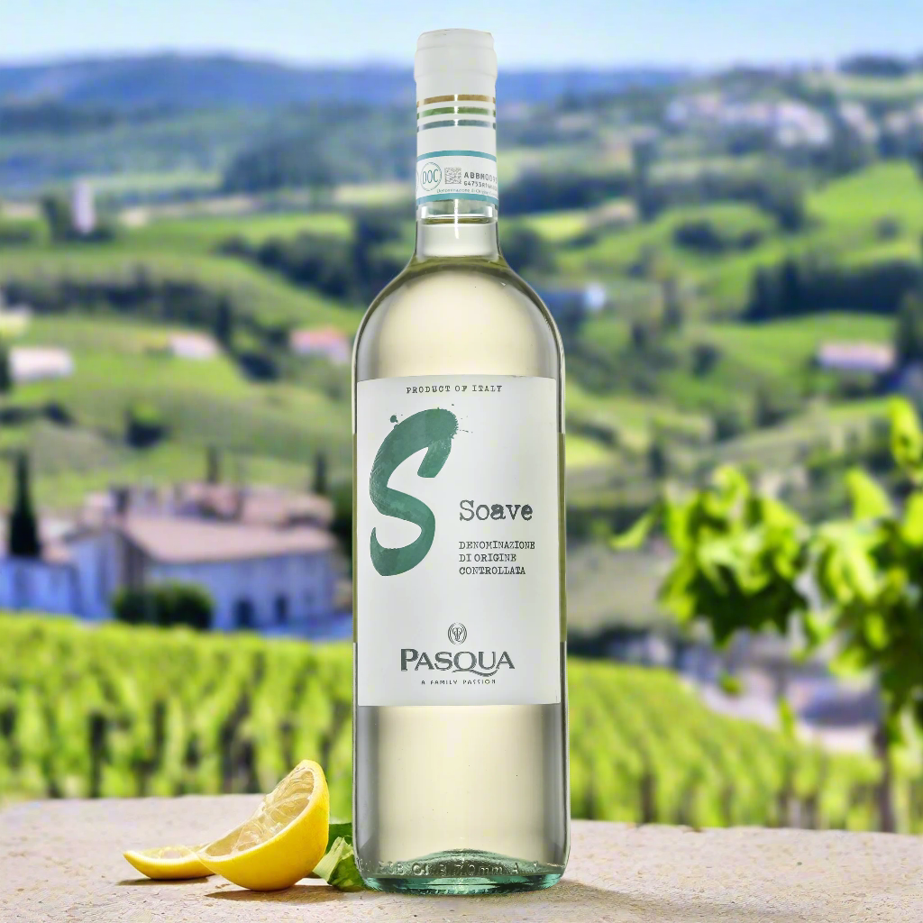 Pasqua Colori D’Italia Soave bottle on stone table with lemons and vineyard view