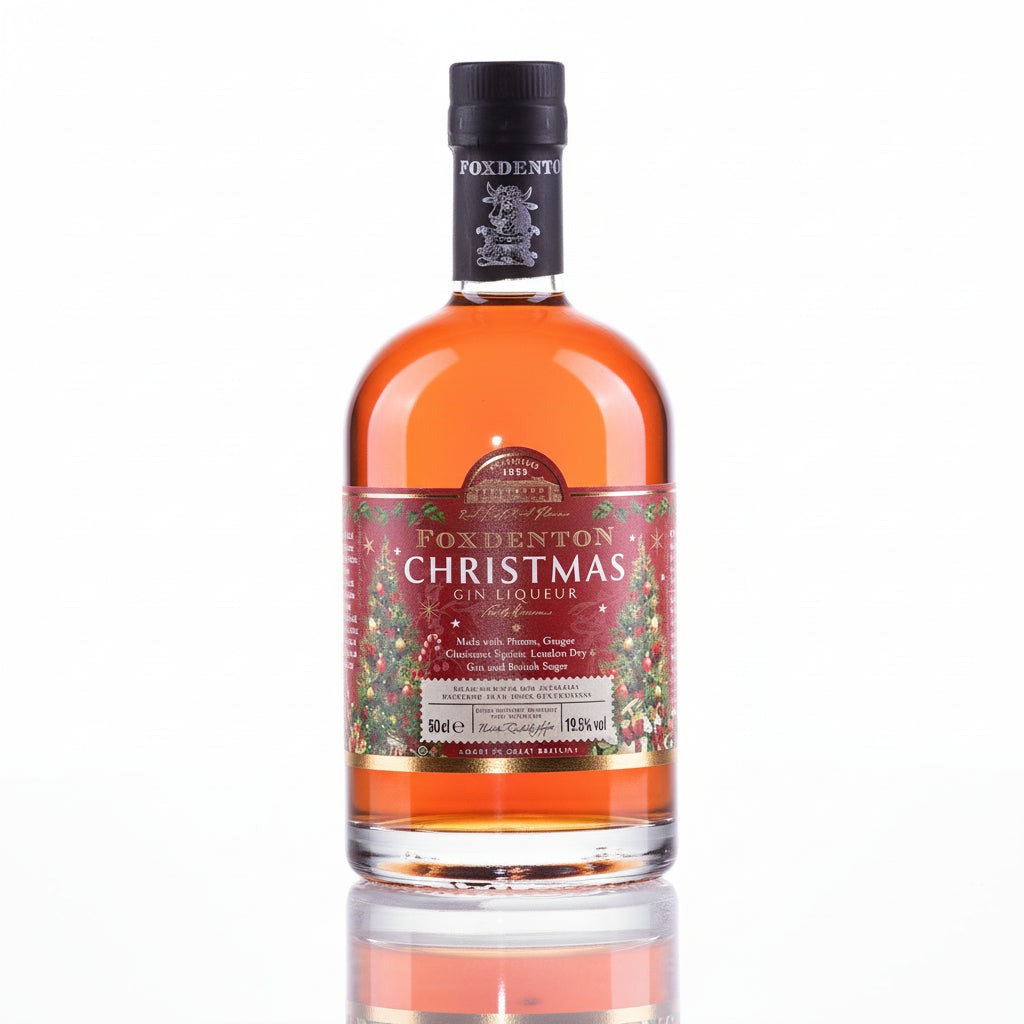 Bottle of Foxdenton Christmas Gin Liqueur on a white background