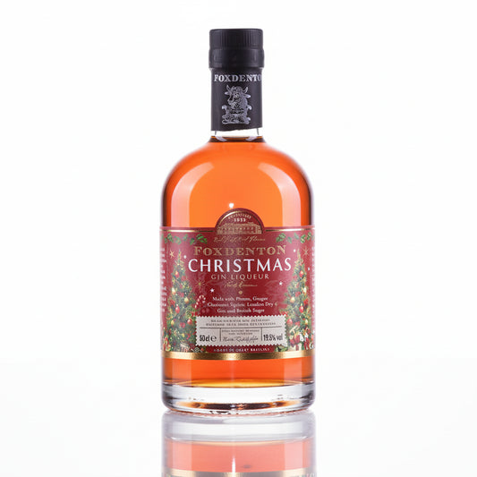 Bottle of Foxdenton Christmas Gin Liqueur on a white background