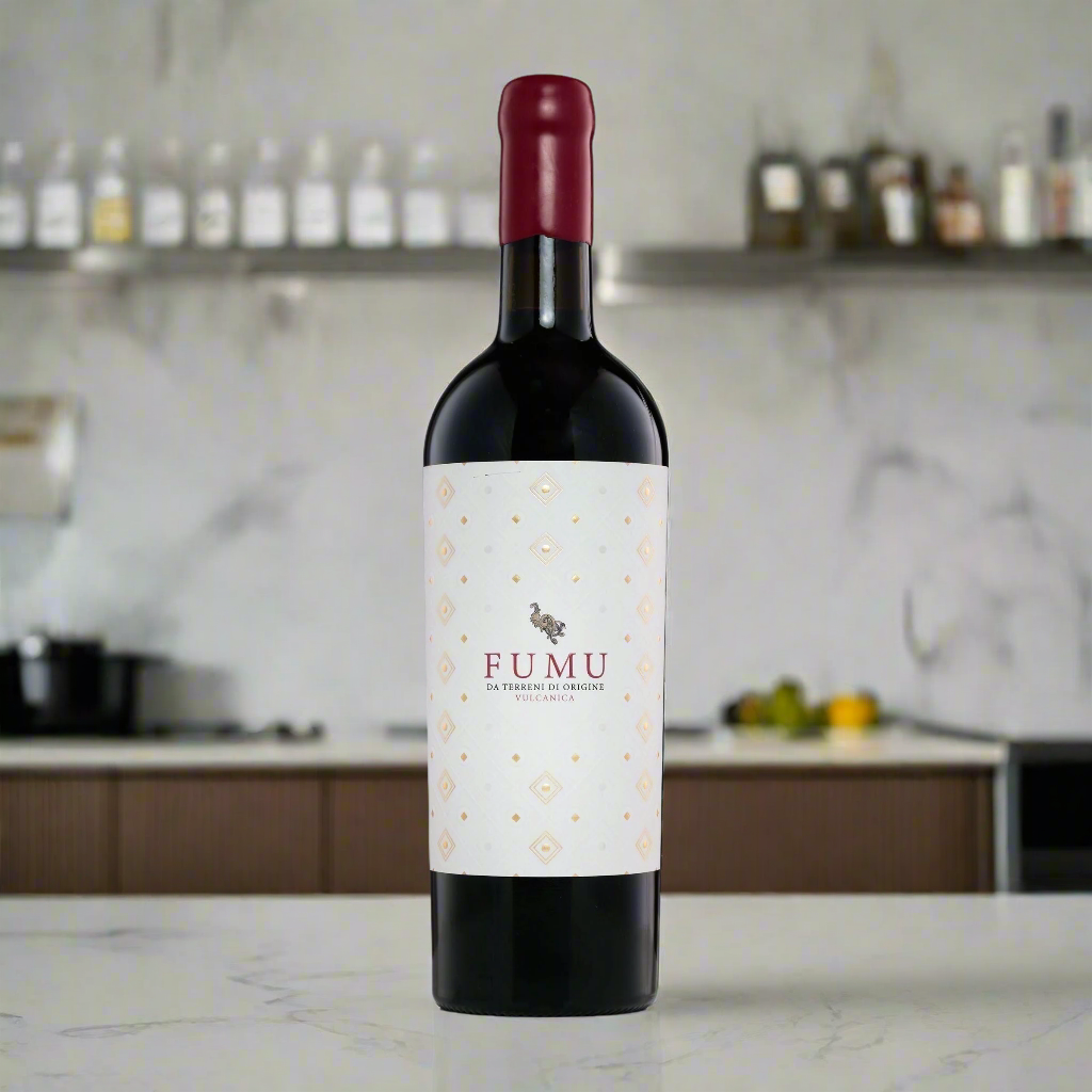 Place a bottle of Fumu Rosso Terre Siciliane IGT on a sleek kitchen counter with a modern Italian kitchen backdrop, evoking a stylish, contemporary atmosphere.