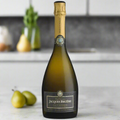 Jacques Bruere Cap Classique Brut with pear and lemon in modern kitchen