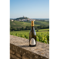 Joseph Mellot Sancerre La Grande Chatelaine wine bottle displayed on a limestone terrace overlooking the vineyards of Sancerre in the Loire Valley.