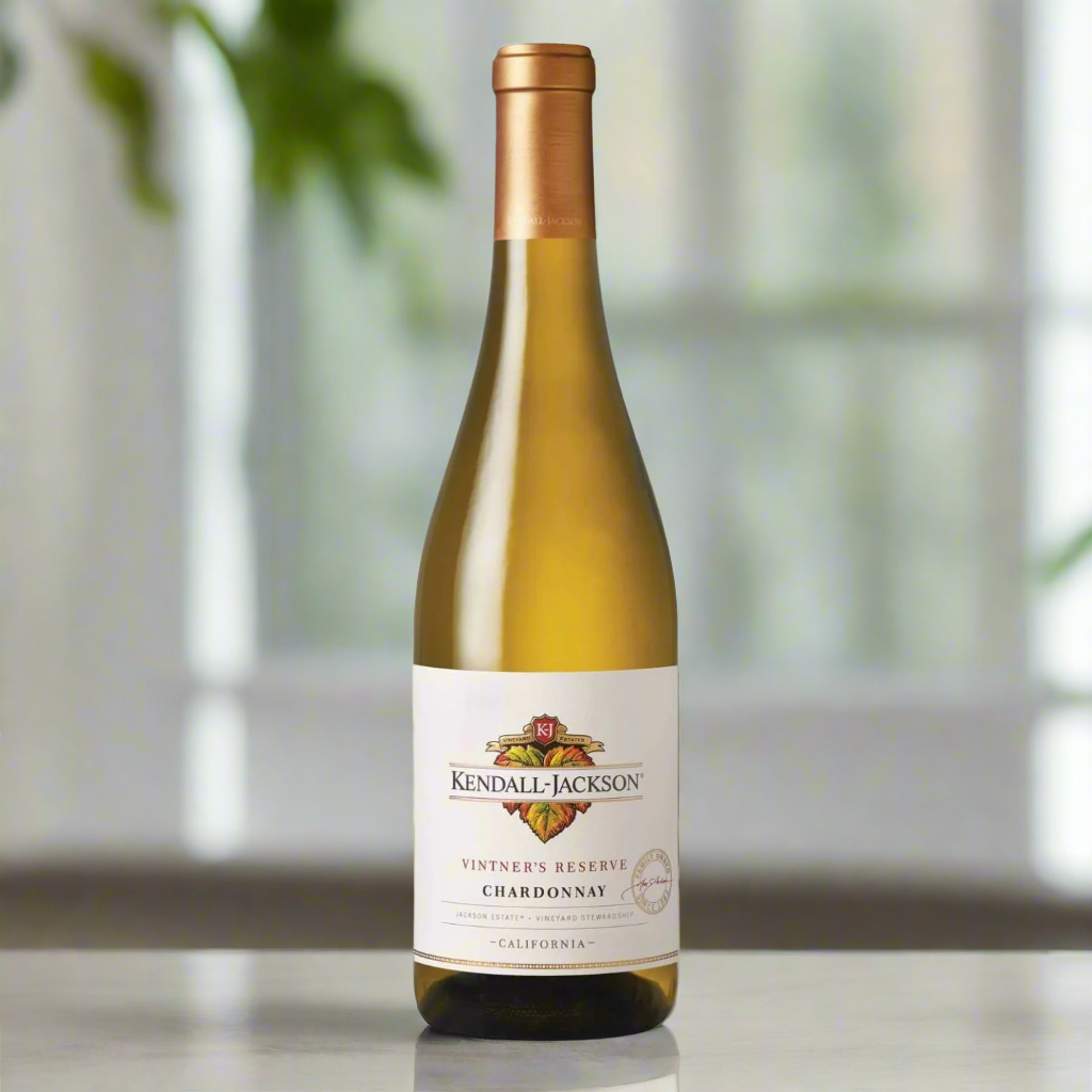 Bottle of Kendall-Jackson Chardonnay on a clean white surface with soft natural light and subtle reflections. Blurred green foliage in the background. Simple, fresh, and elegant.