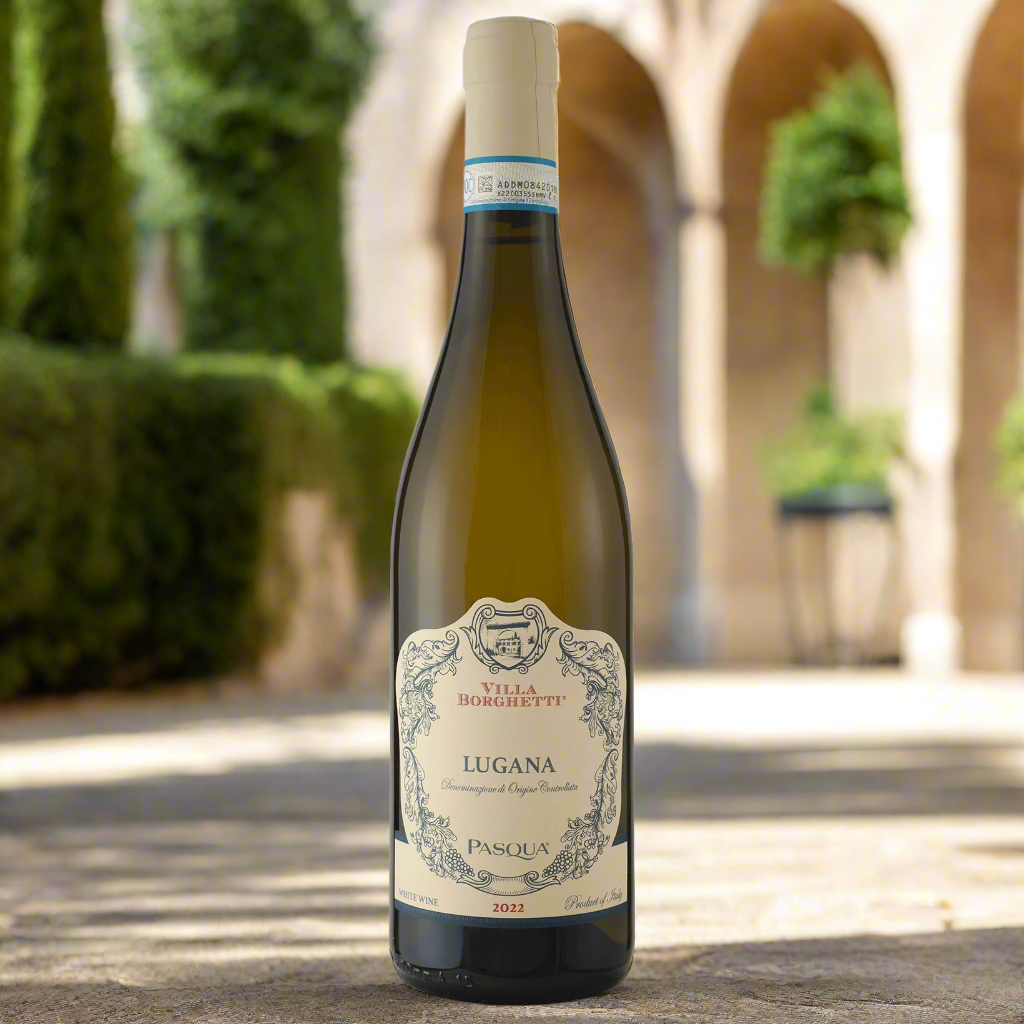 Pasqua Villa Borghetti Lugana bottle in a sunlit courtyard
