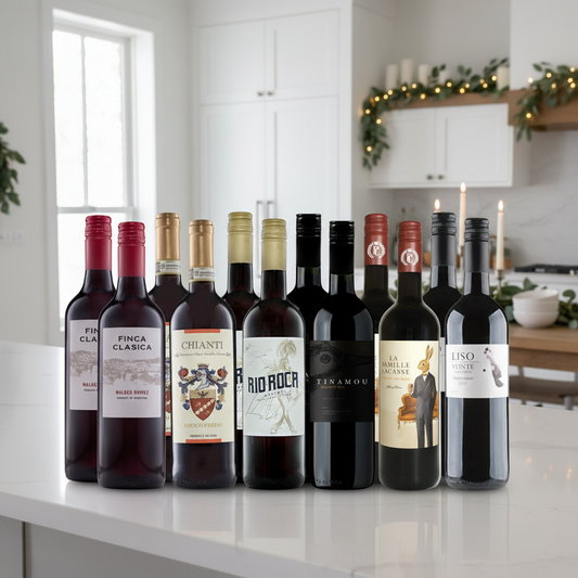 Festive Essentials Value Red Wine 12 Bottle Case on bright modern kitchen counter with festive greenery.