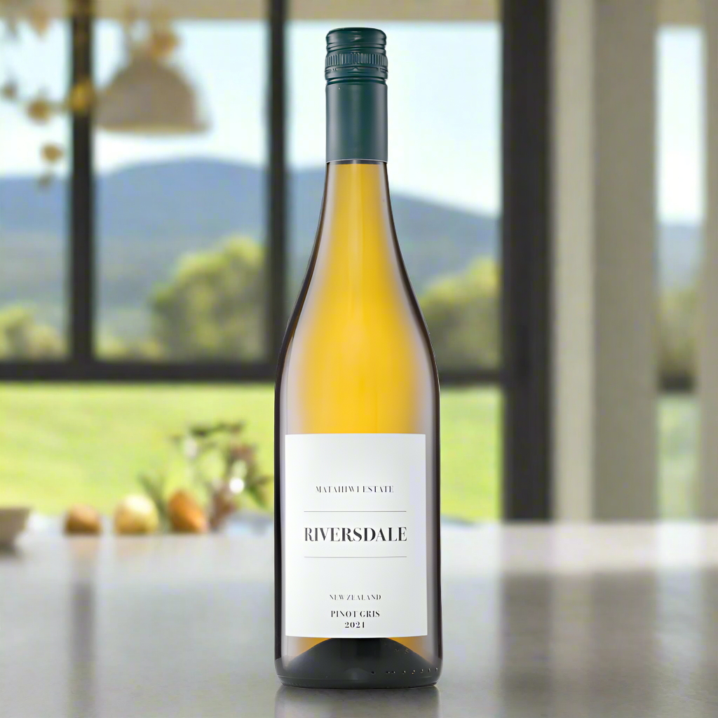 Pinot Gris bottle on modern kitchen counter with lemon zest and eucalyptus.