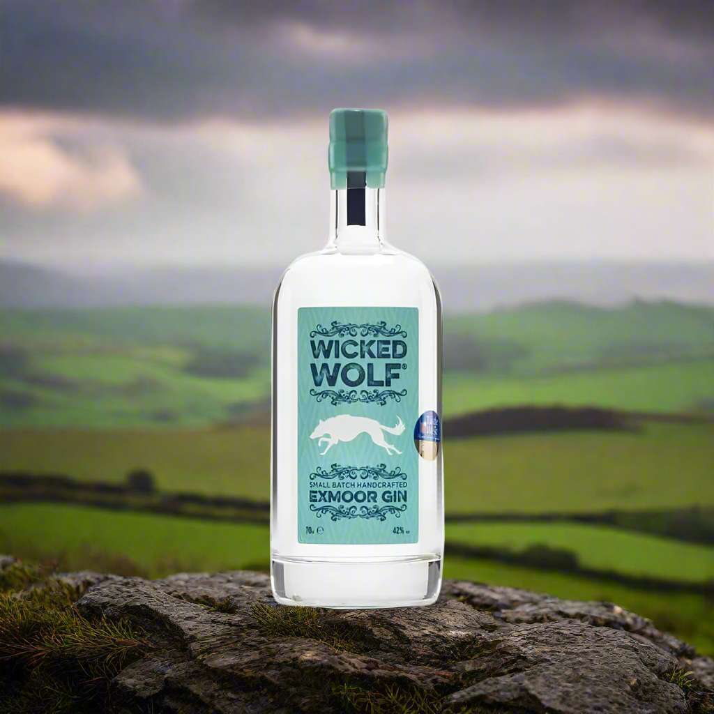 Misty Exmoor Landscape at Dawn
A moody, dramatic view of the Exmoor hills—mist rolling over heather-covered moorland with a hint of the coast in the distance. The bottle sits on a weathered stone or wooden post, channelling the raw beauty and mystery of the West Country.