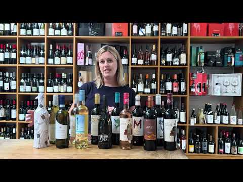 Unboxing the Baker’s Dozen Wine Case with 13 bottles of mixed wine, tasting notes, and food pairings.